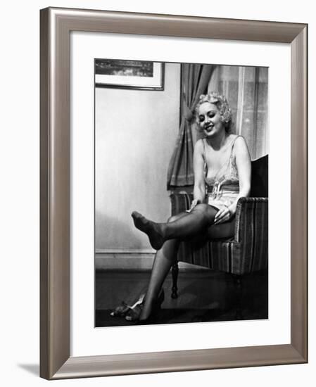 Ex-Burlesque Stripper June St. Clair Removing Stockings at the Allen Gilbert School of Undressing-Peter Stackpole-Framed Photographic Print
