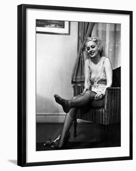 Ex-Burlesque Stripper June St. Clair Removing Stockings at the Allen Gilbert School of Undressing-Peter Stackpole-Framed Photographic Print