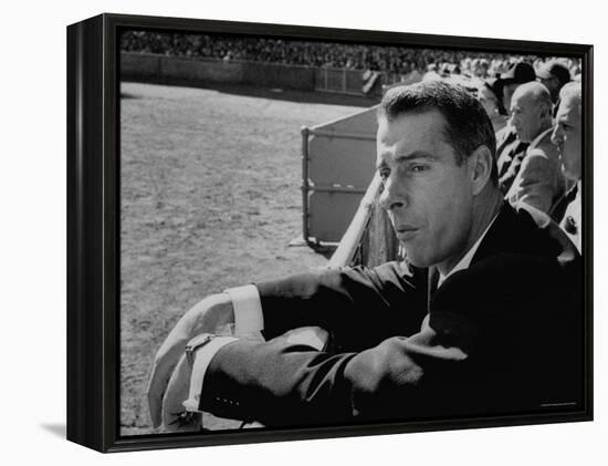 Ex Yankee Baseball Player Joe DiMaggio, Leaning over Rail Watching 3rd Game of the World Series-Grey Villet-Framed Premier Image Canvas