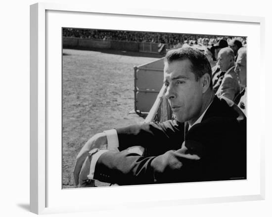 Ex Yankee Baseball Player Joe DiMaggio, Leaning over Rail Watching 3rd Game of the World Series-Grey Villet-Framed Premium Photographic Print