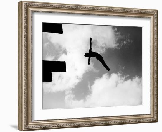 Excellent of Man Silhouetted Against Sky Doing Back Dive Off High Board-Rex Hardy Jr.-Framed Photographic Print