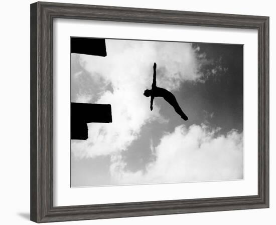 Excellent of Man Silhouetted Against Sky Doing Back Dive Off High Board-Rex Hardy Jr.-Framed Photographic Print