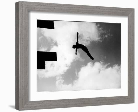 Excellent of Man Silhouetted Against Sky Doing Back Dive Off High Board-Rex Hardy Jr.-Framed Photographic Print