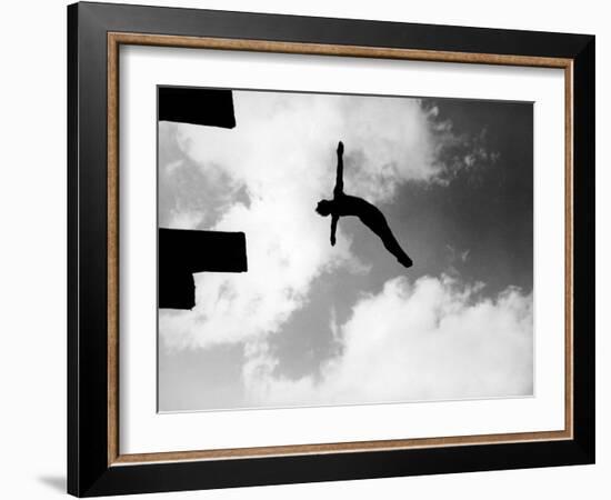 Excellent of Man Silhouetted Against Sky Doing Back Dive Off High Board-Rex Hardy Jr.-Framed Photographic Print