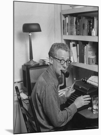 Excellent of Pulitzer Prize Winning Journalist Murray Kempton Smoking Pipe at Typewriter-Martha Holmes-Mounted Premium Photographic Print