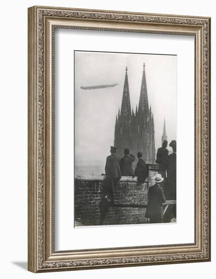 Excited Spectators Watching a Zeppelin Z111 Fly Over Cologne Cathedral Germany-null-Framed Photographic Print