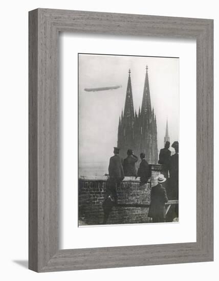 Excited Spectators Watching a Zeppelin Z111 Fly Over Cologne Cathedral Germany-null-Framed Photographic Print