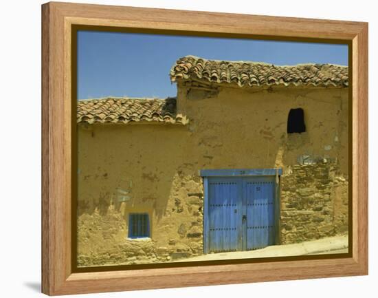 Exterior of an Adobe House with a Tile Roof and Blue Door, Salamanca, Castile Leon, Spain-Michael Busselle-Framed Premier Image Canvas