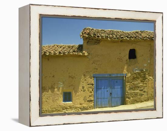 Exterior of an Adobe House with a Tile Roof and Blue Door, Salamanca, Castile Leon, Spain-Michael Busselle-Framed Premier Image Canvas