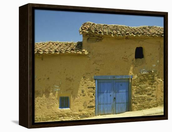 Exterior of an Adobe House with a Tile Roof and Blue Door, Salamanca, Castile Leon, Spain-Michael Busselle-Framed Premier Image Canvas