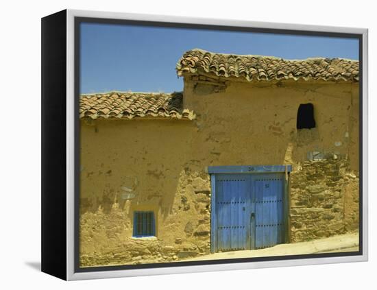 Exterior of an Adobe House with a Tile Roof and Blue Door, Salamanca, Castile Leon, Spain-Michael Busselle-Framed Premier Image Canvas