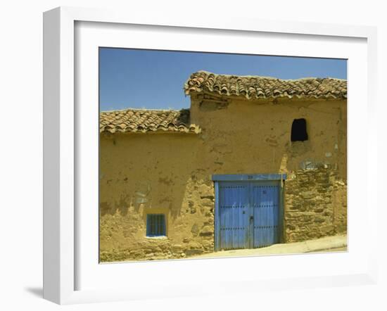 Exterior of an Adobe House with a Tile Roof and Blue Door, Salamanca, Castile Leon, Spain-Michael Busselle-Framed Photographic Print