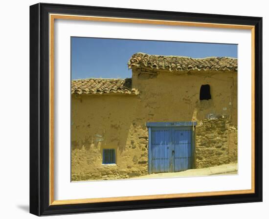 Exterior of an Adobe House with a Tile Roof and Blue Door, Salamanca, Castile Leon, Spain-Michael Busselle-Framed Photographic Print