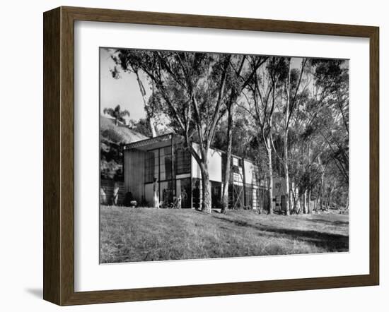 Exterior View of Charles Eames House, Showing How it Nudges into a Hillside-Peter Stackpole-Framed Photographic Print