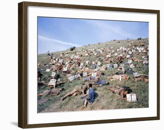 Extras Playing Dead People Hold Numbered Cards Between Takes During Filming of "Spartacus"-J^ R^ Eyerman-Framed Photographic Print