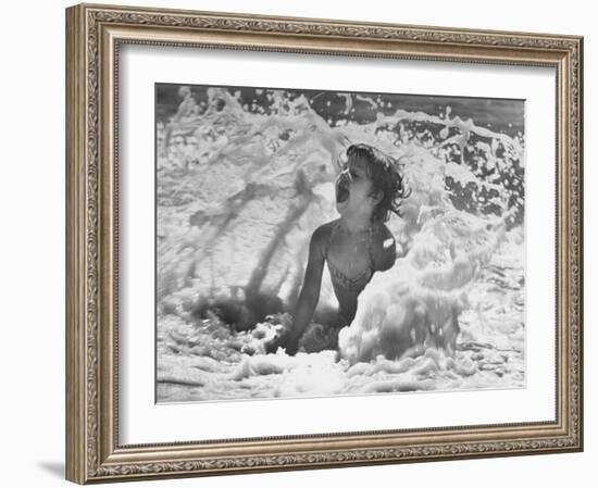 Exuberant Young Girl Getting Splashed by a Wave in the Surf at Jones Beach-Alfred Eisenstaedt-Framed Photographic Print