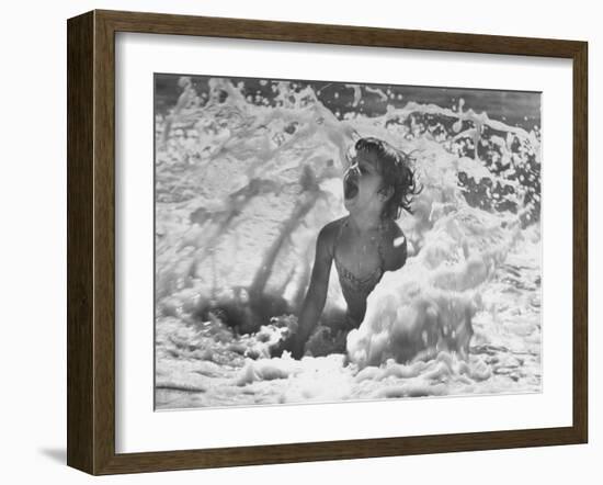 Exuberant Young Girl Getting Splashed by a Wave in the Surf at Jones Beach-Alfred Eisenstaedt-Framed Photographic Print