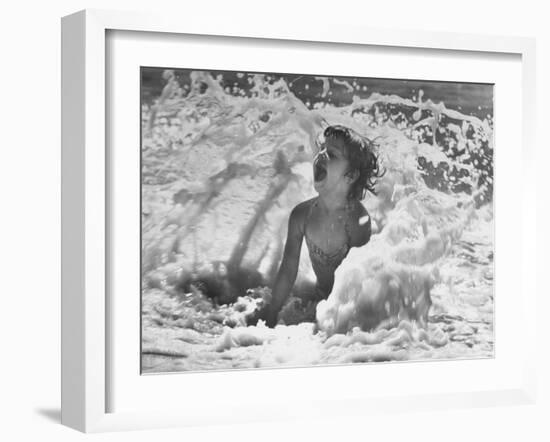 Exuberant Young Girl Getting Splashed by a Wave in the Surf at Jones Beach-Alfred Eisenstaedt-Framed Photographic Print