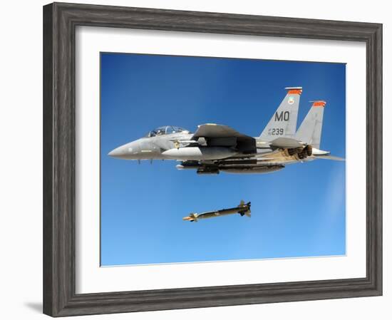 F-15 Strike Eagle Fighter Drops a Guided Bomb in Exercises, Ca. 1980s-null-Framed Photo