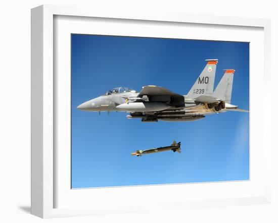 F-15 Strike Eagle Fighter Drops a Guided Bomb in Exercises, Ca. 1980s-null-Framed Photo