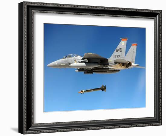 F-15 Strike Eagle Fighter Drops a Guided Bomb in Exercises, Ca. 1980s-null-Framed Photo