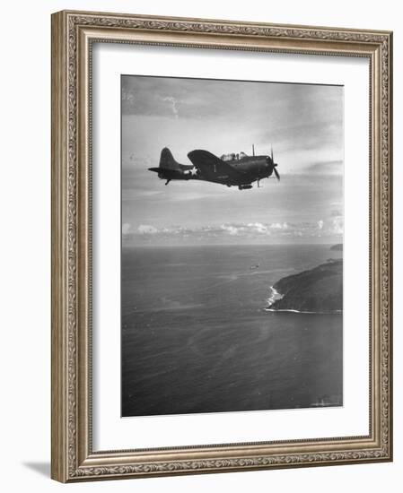 F-6 Hellcat Fighter Plane over Tanahmera Bay as Japanese Airfields at Hollandia, New Guinea-J^ R^ Eyerman-Framed Photographic Print