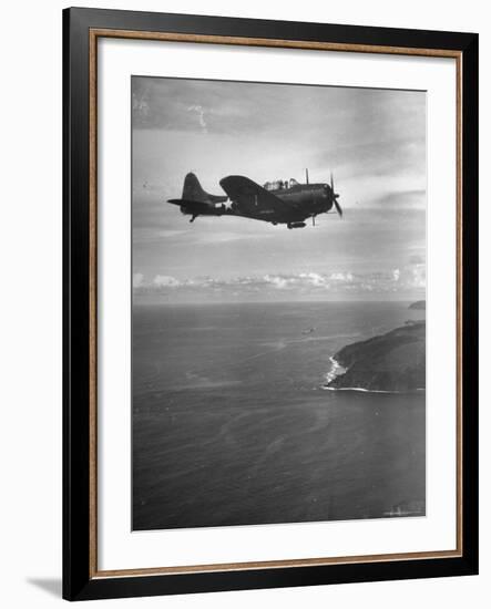 F-6 Hellcat Fighter Plane over Tanahmera Bay as Japanese Airfields at Hollandia, New Guinea-J^ R^ Eyerman-Framed Photographic Print