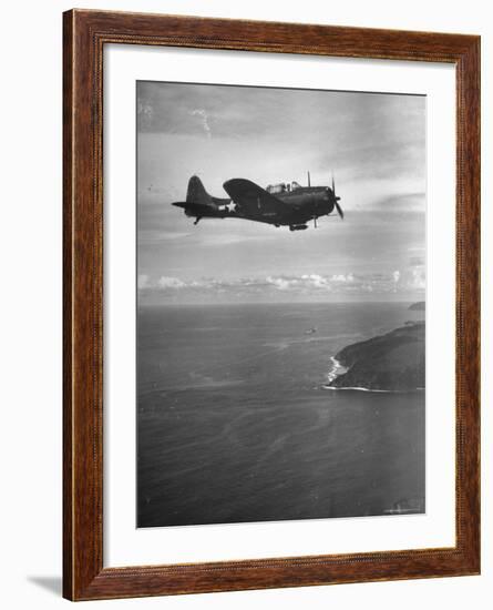 F-6 Hellcat Fighter Plane over Tanahmera Bay as Japanese Airfields at Hollandia, New Guinea-J^ R^ Eyerman-Framed Photographic Print