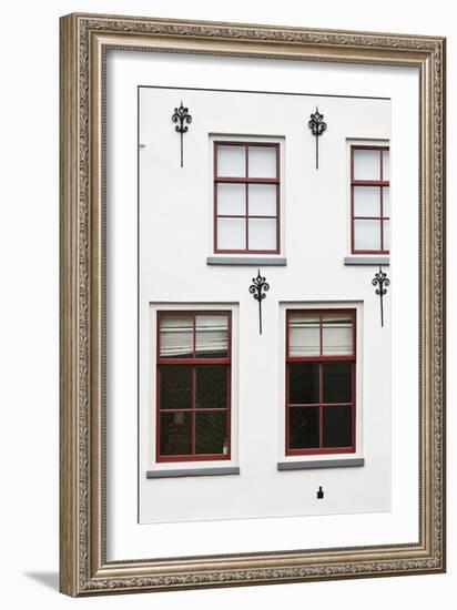 Facade of a Traditional Town House in Utrecht, Netherlands-Julian Castle-Framed Photo