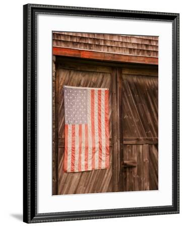 Faded American Flag On Old Barn Entrance Maine Usa Photographic