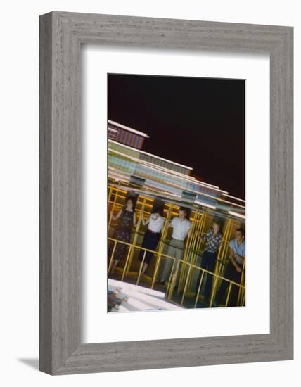 Fairgoers on a 'Round-Up' Spinning Amusement Ride at the Iowa State Fair, Des Moines, Iowa, 1955-John Dominis-Framed Photographic Print