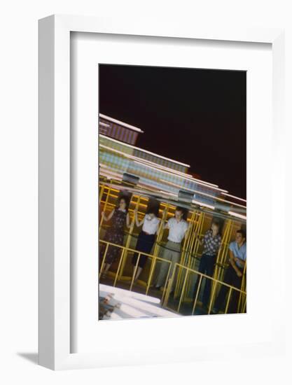 Fairgoers on a 'Round-Up' Spinning Amusement Ride at the Iowa State Fair, Des Moines, Iowa, 1955-John Dominis-Framed Photographic Print