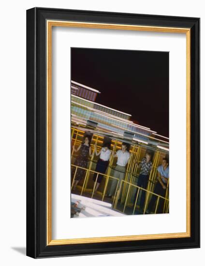 Fairgoers on a 'Round-Up' Spinning Amusement Ride at the Iowa State Fair, Des Moines, Iowa, 1955-John Dominis-Framed Photographic Print