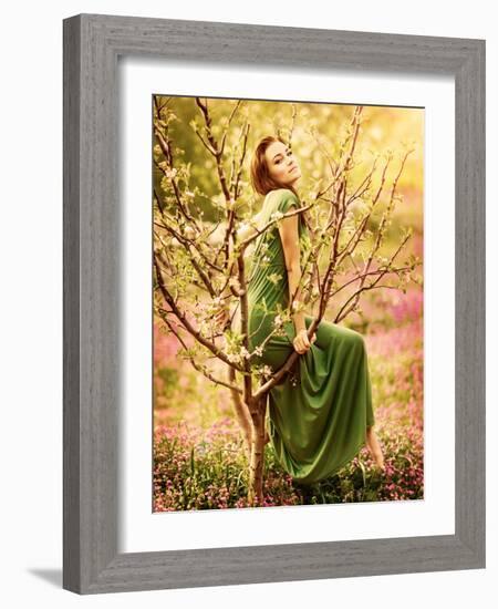 Fairy-Tail Forest Nymph, Beautiful Sexy Woman at Spring Garden, Wearing Long Dress, Sitting on Bloo-Anna Omelchenko-Framed Photographic Print