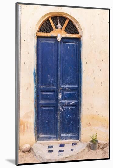 Faiyum, Egypt. A blue painted door on a building.-Emily Wilson-Mounted Photographic Print