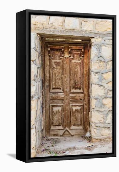 Faiyum, Egypt. Wooden door in a wall.-Emily Wilson-Framed Premier Image Canvas