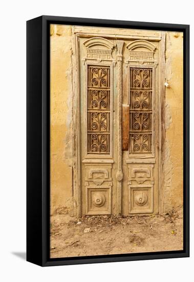 Faiyum, Egypt. Wooden door on a building.-Emily Wilson-Framed Premier Image Canvas