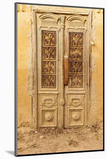 Faiyum, Egypt. Wooden door on a building.-Emily Wilson-Mounted Photographic Print