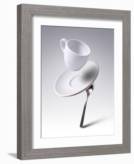 Falling Coffee Cup With Spoon And Saucer-adnrey-Framed Photographic Print