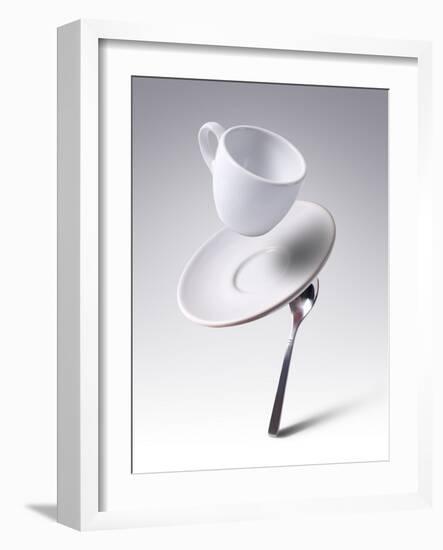 Falling Coffee Cup With Spoon And Saucer-adnrey-Framed Photographic Print