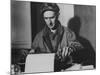 Famed Journalist and War Correspondent Ernie Pyle Working at Typewriter-null-Mounted Premium Photographic Print