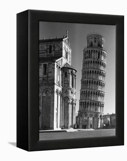 Famed Leaning Tower of Pisa Standing Next to the Baptistry of the Cathedral-Margaret Bourke-White-Framed Premier Image Canvas