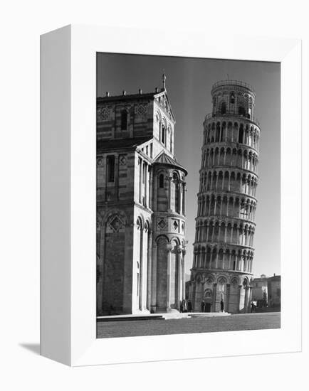 Famed Leaning Tower of Pisa Standing Next to the Baptistry of the Cathedral-Margaret Bourke-White-Framed Premier Image Canvas