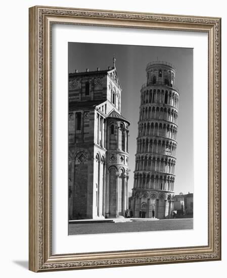 Famed Leaning Tower of Pisa Standing Next to the Baptistry of the Cathedral-Margaret Bourke-White-Framed Photographic Print