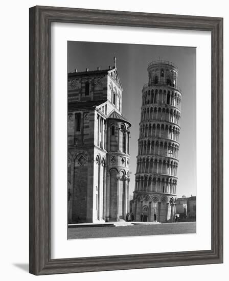 Famed Leaning Tower of Pisa Standing Next to the Baptistry of the Cathedral-Margaret Bourke-White-Framed Photographic Print