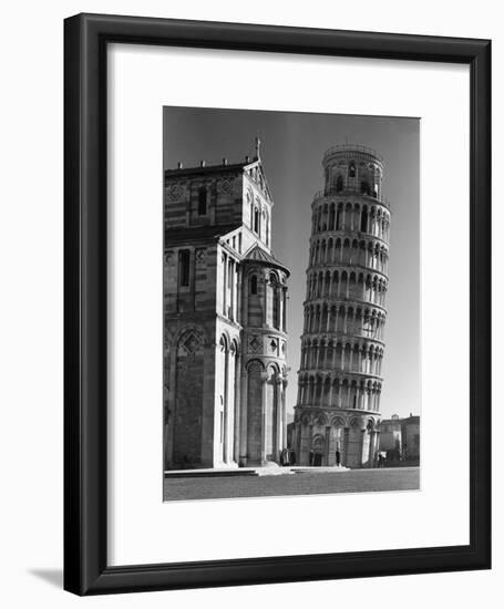 Famed Leaning Tower of Pisa Standing Next to the Baptistry of the Cathedral-Margaret Bourke-White-Framed Photographic Print