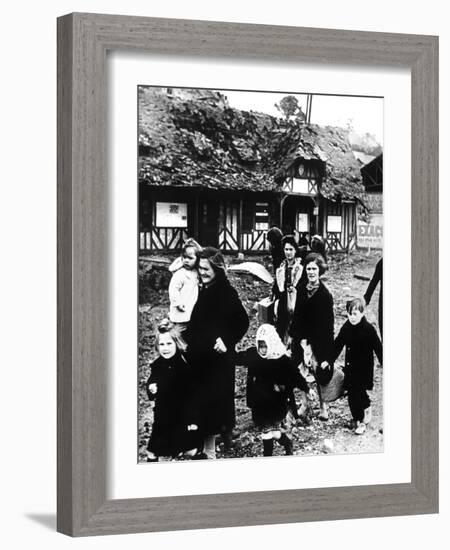 Families Leaving their Village Bombarded During the Normandy Landings, France, 1944-null-Framed Giclee Print