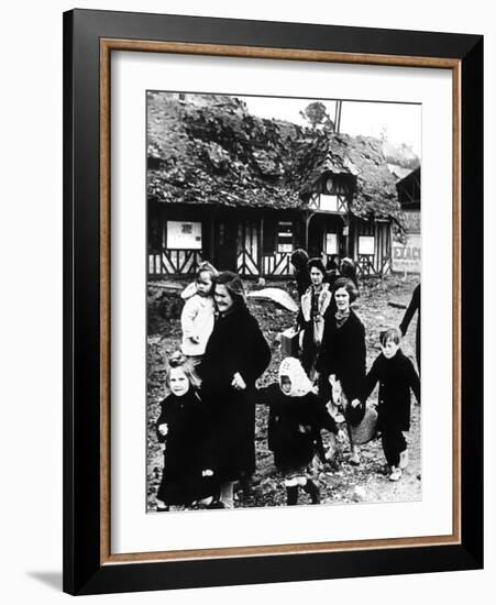 Families Leaving their Village Bombarded During the Normandy Landings, France, 1944-null-Framed Giclee Print