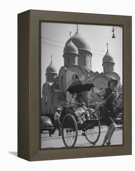 Family Being Pulled in a Rickshaw with a Russian Orthodox Church in the Background-Jack Birns-Framed Premier Image Canvas