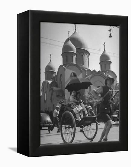 Family Being Pulled in a Rickshaw with a Russian Orthodox Church in the Background-Jack Birns-Framed Premier Image Canvas